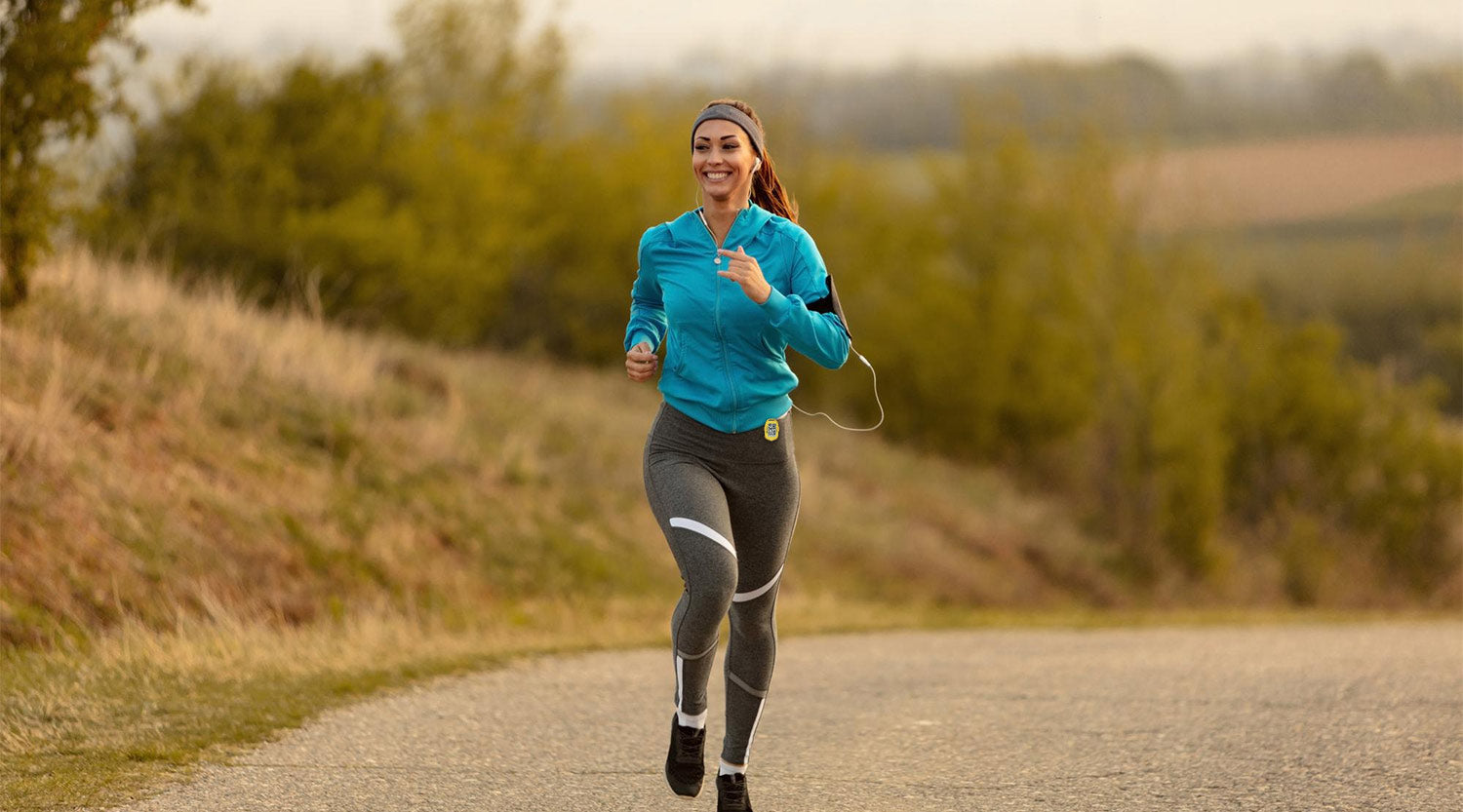 UK adult doing a Japanese walking fast interval on a spring morning with a 3DFitBud pedometer clipped to their waistband