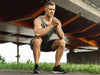 Muscular man calisthenics workout outdoors