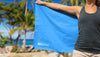 woman with her 3DActive microfiber towel at the beach