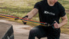 Muscular man working out outdoors with 3DActive Resistance Bands with Handles